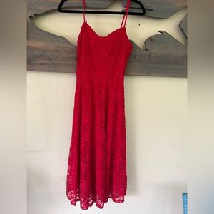 Lulu’s form fitting red lace midi dress